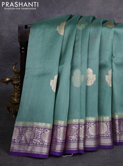 Banarasi organza saree pastel green and violet with zari woven buttas and zari woven border