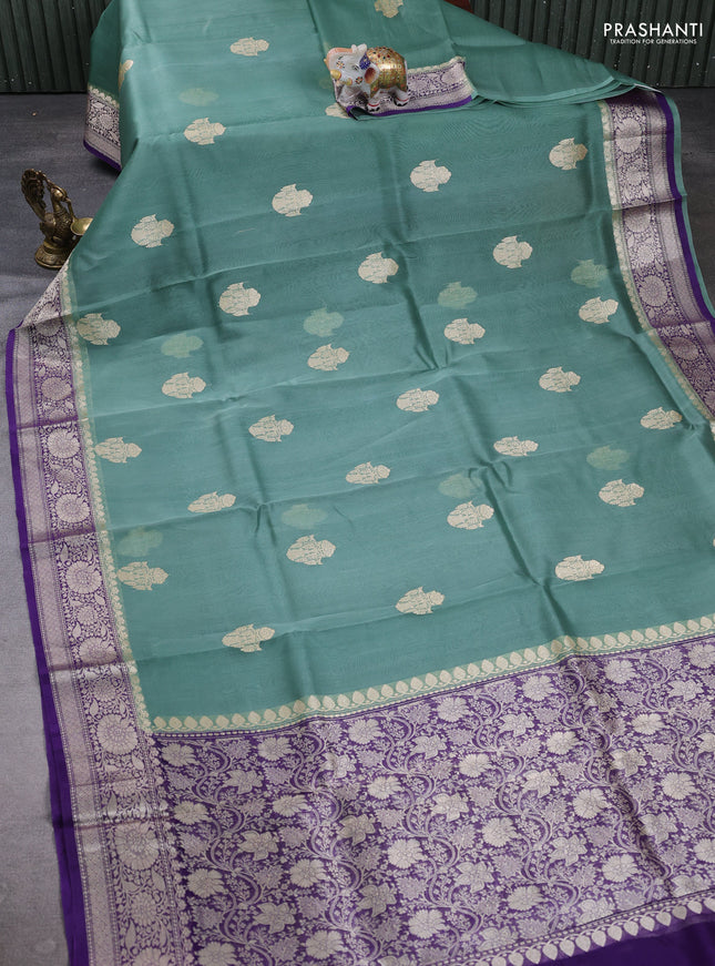 Banarasi organza saree pastel green and violet with zari woven buttas and zari woven border