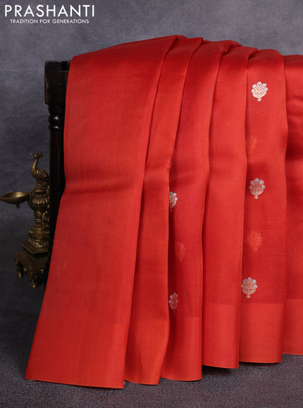 Banarasi organza saree orange with zari woven buttas in borderless style
