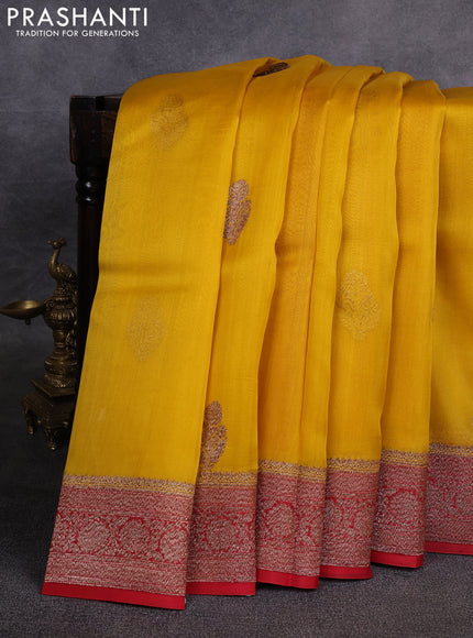 Banarasi organza saree yellow and red with woven buttas and banarasi style border