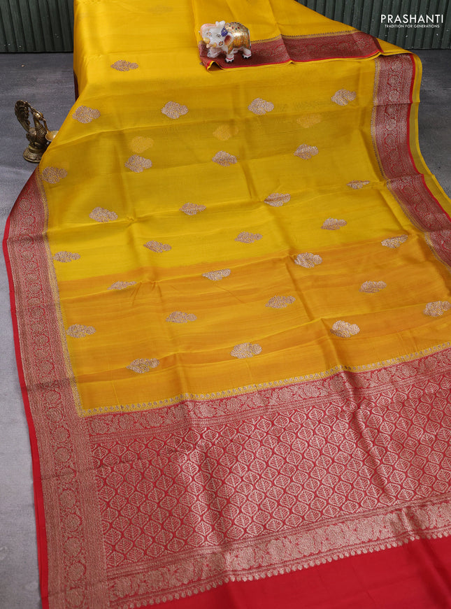 Banarasi organza saree yellow and red with woven buttas and banarasi style border