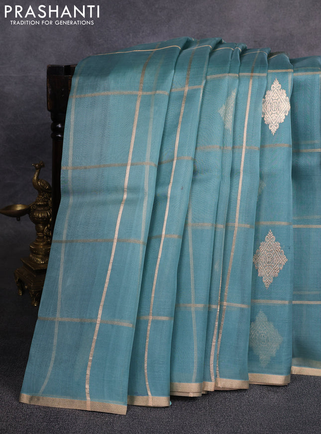 Banarasi organza saree pastel blue with allover zari checks & buttas and zari woven piping border