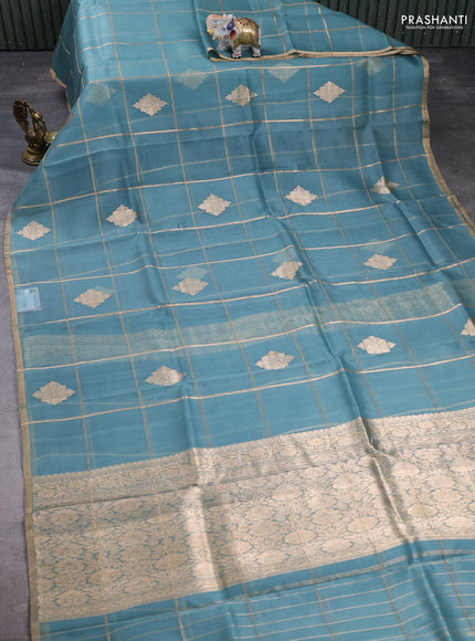 Banarasi organza saree pastel blue with allover zari checks & buttas and zari woven piping border
