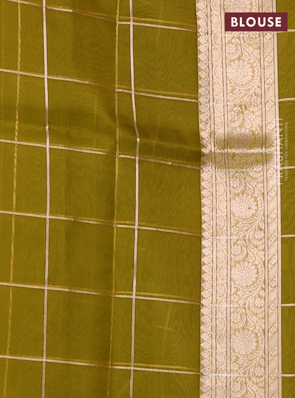 Banarasi organza saree dark mustard with allover zari checks & buttas and zari woven piping border