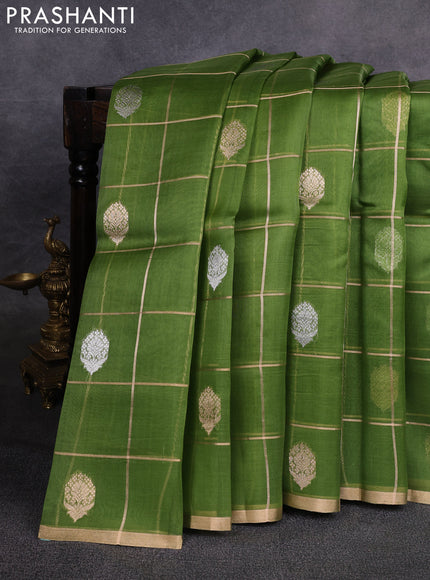Banarasi organza saree light green with allover zari checks & buttas and zari woven piping border