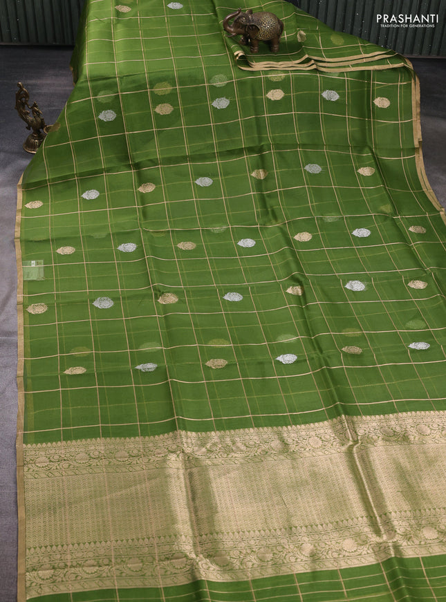 Banarasi organza saree light green with allover zari checks & buttas and zari woven piping border