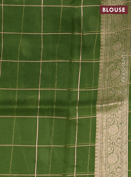 Banarasi organza saree light green with allover zari checks & buttas and zari woven piping border