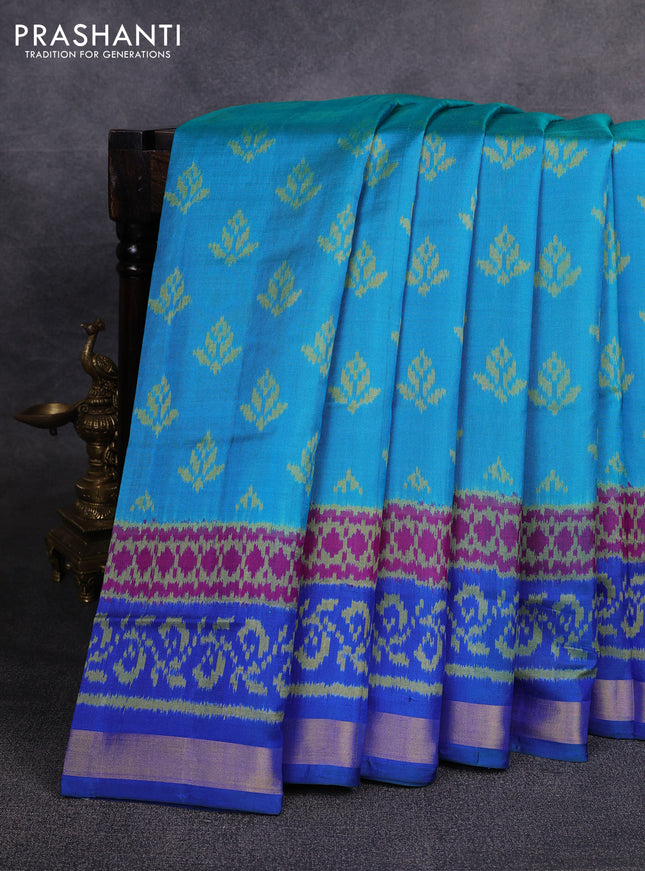 Rajkot patola silk saree teal blue and blue with allover ikat butta weaves and ikat woven zari border