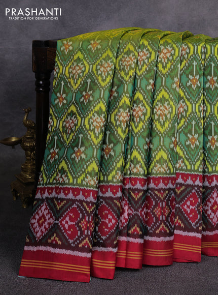 Rajkot patola silk saree olive green and red with allover ikat weaves and ikat woven border