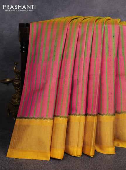 Rajkot patola silk saree green pink and yellow with allover ikat weaves & jute finish and zari woven border