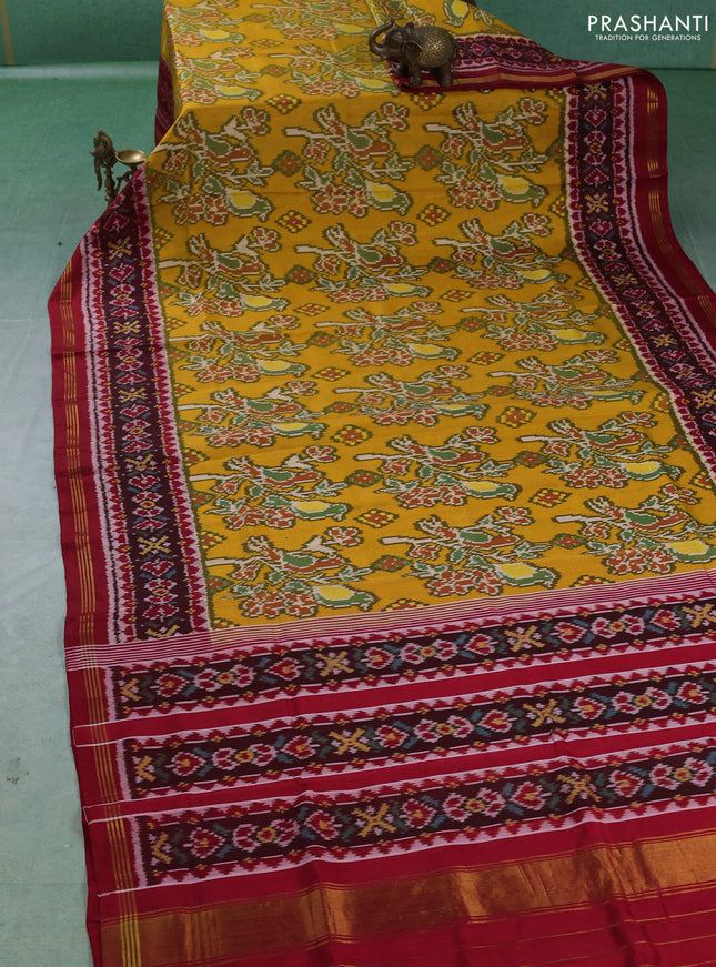 Rajkot patola silk saree yellow and red with allover ikat weaves and ikat woven border
