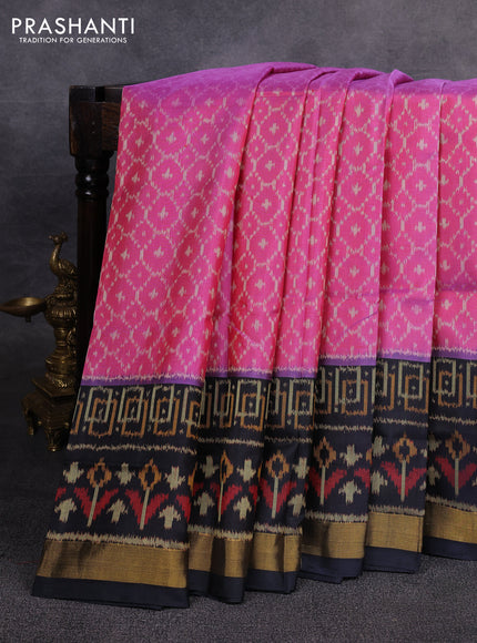Rajkot patola silk saree dual shade of pink and black with allover ikat weaves and ikat woven zari border