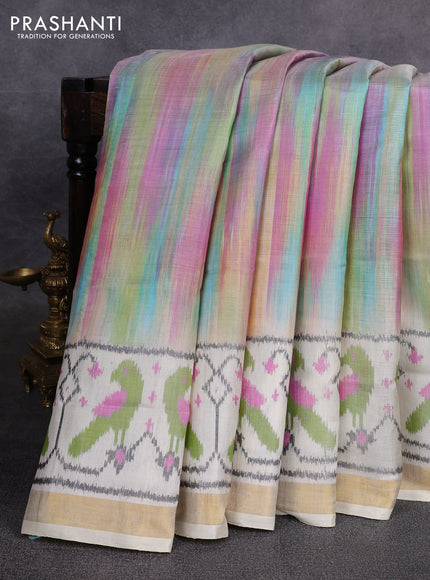 Rajkot patola silk saree rainbow colour and cream with allover ikat weaves and ikat woven zari border