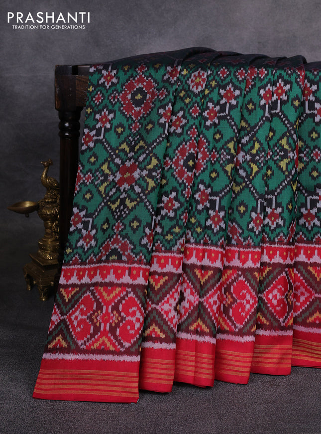 Rajkot patola silk saree green and maroon with allover ikat weaves and ikat woven zari border