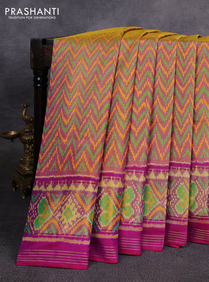 Rajkot patola silk saree multi colour and purple with allover ikat weaves and ikat woven zari border