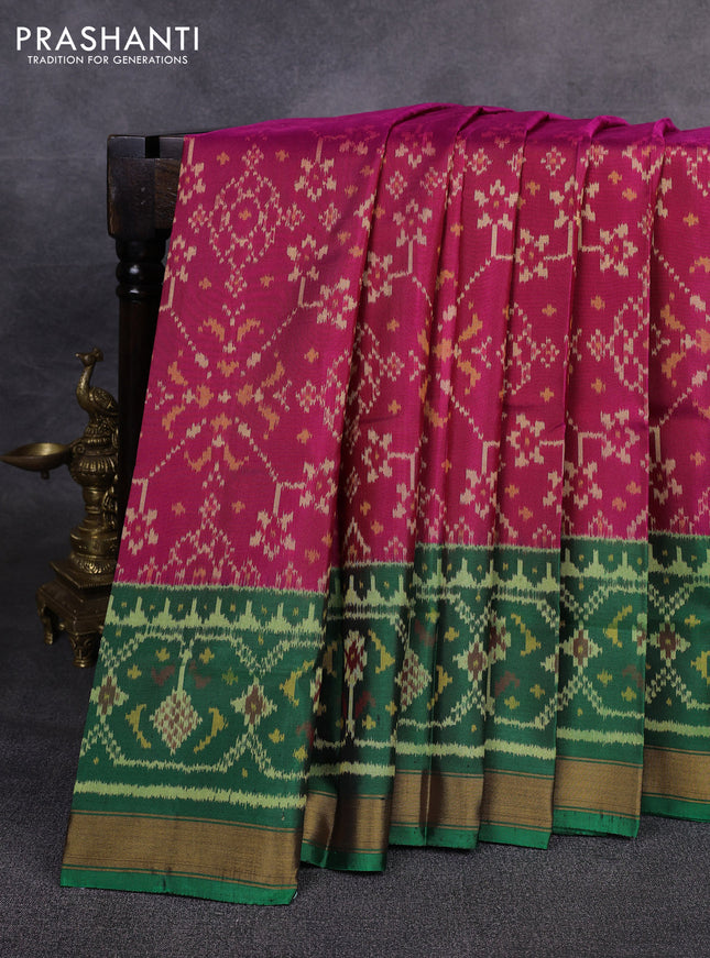 Rajkot patola silk saree dark pink and green blue with allover ikat weaves and ikat woven zari border