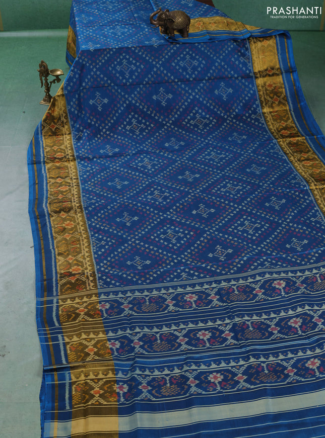 Rajkot patola silk saree peacock blue with allover ikat weaves and zari woven ikat border