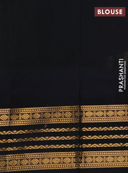 Kuppadam silk cotton saree light green and black with zari woven buttas and temple design zari woven border