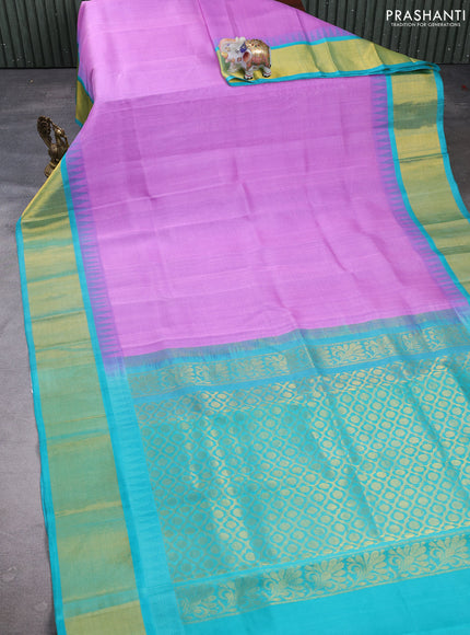 Kuppadam silk cotton saree lavender and teal green with plain body and temple design zari woven border