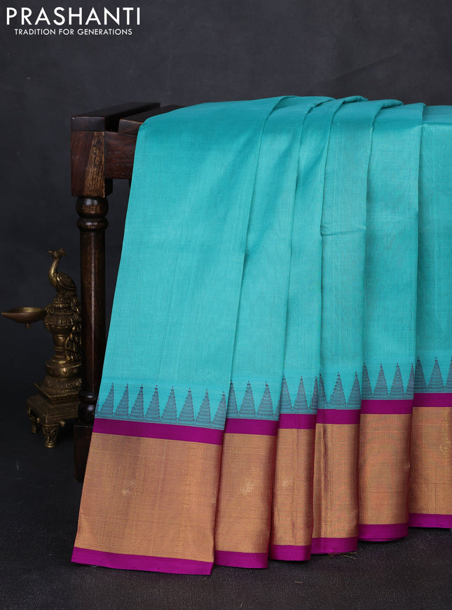 Kuppadam silk cotton saree teal blue and purple with plain body and temple design zari woven border