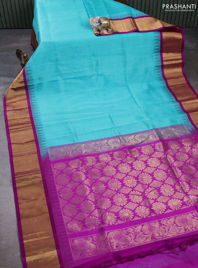 Kuppadam silk cotton saree teal blue and purple with plain body and temple design zari woven border