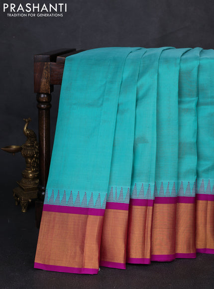Kuppadam silk cotton saree teal blue and purple with plain body and temple design zari woven border