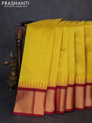 Kuppadam silk cotton saree lime yellow and maroon with plain body and temple design zari woven border