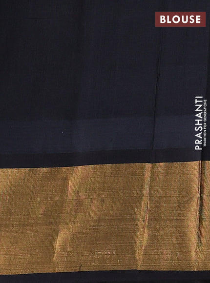 Kuppadam silk cotton saree light green and black with plain body and temple design zari woven border