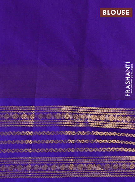 Kuppadam silk cotton saree yellow and violet shade with zari woven buttas and temple design zari woven border