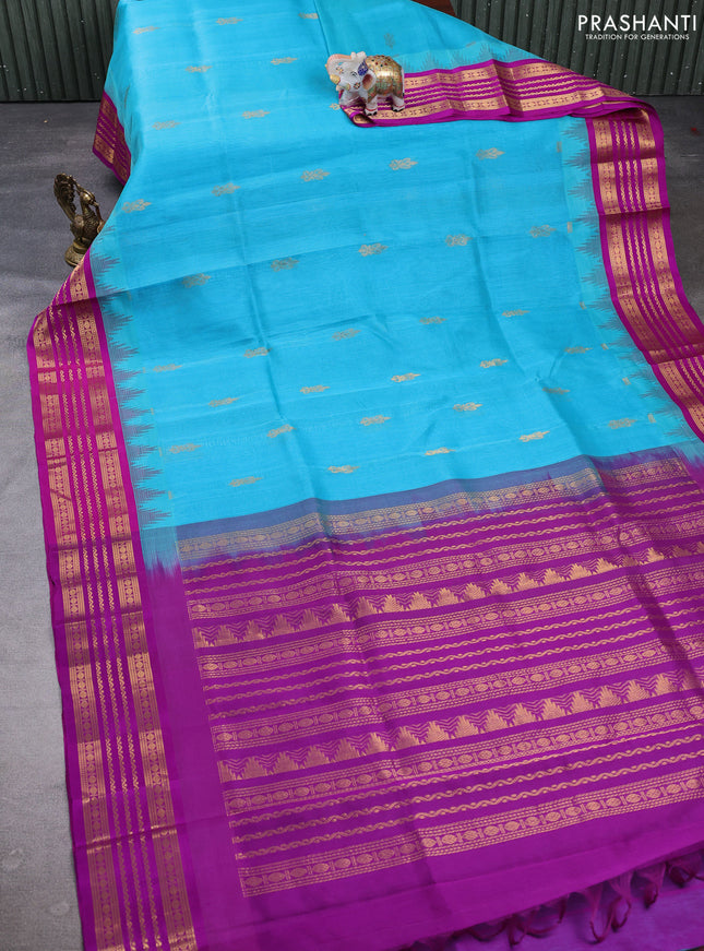 Kuppadam silk cotton saree teal blue and purple with zari woven buttas and temple design zari woven border