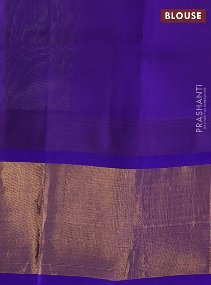 Kuppadam silk cotton saree light green and blue with plain body and temple design zari woven border