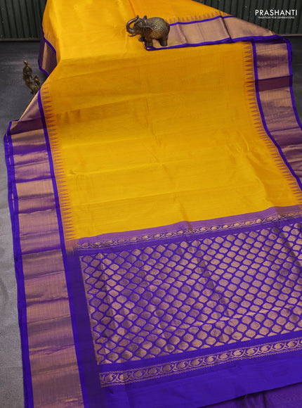 Kuppadam silk cotton saree mango yellow and blue with plain body and temple design zari woven border