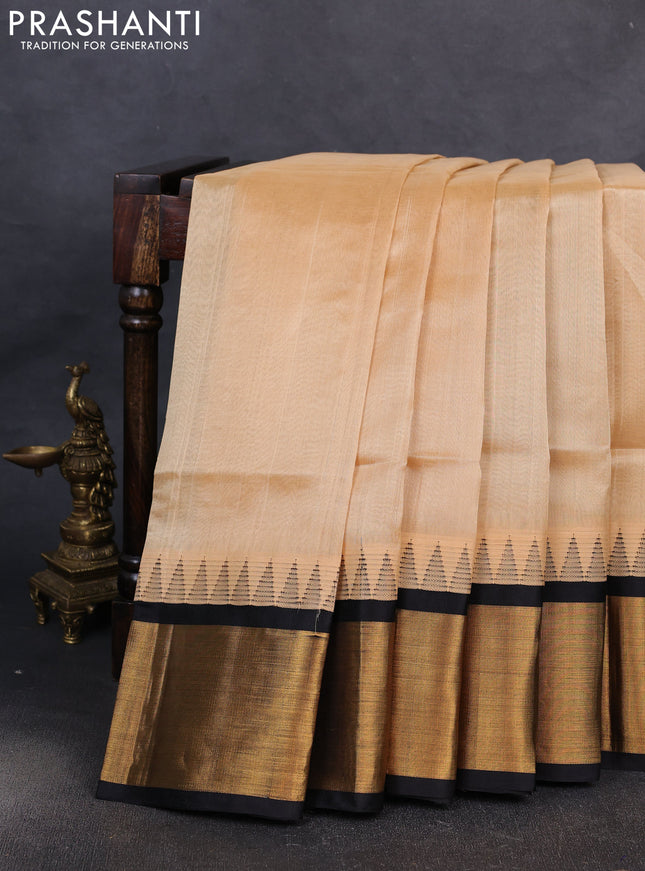 Kuppadam silk cotton saree sandal and black with plain body and temple design zari woven border