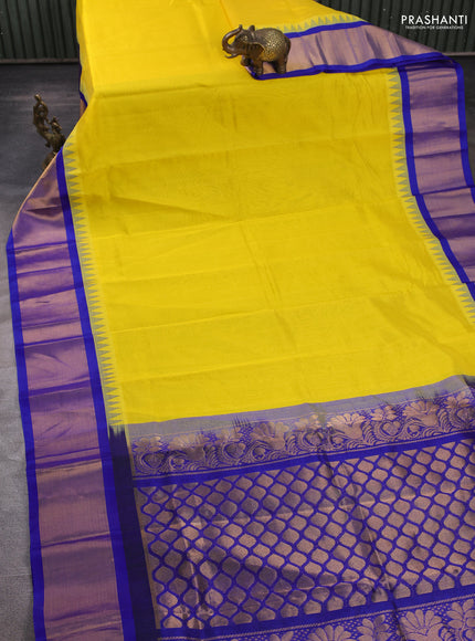 Kuppadam silk cotton saree yellow and blue with plain body and temple design zari woven border