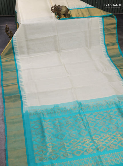 Kuppadam silk cotton saree cream and teal blue with plain body and temple design zari woven border