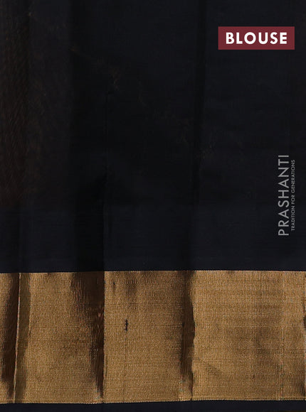 Kuppadam silk cotton saree dual shade of yellowish pink and black with plain body and temple design zari woven border