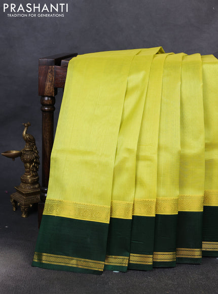 Kuppadam silk cotton saree lime yellow and bottle green with plain body and rettapet zari woven border