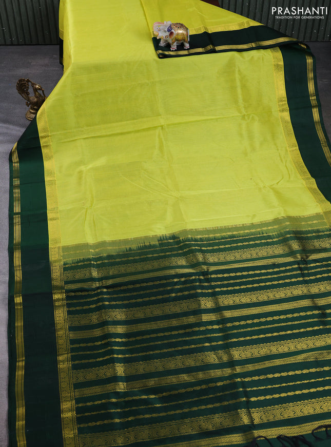 Kuppadam silk cotton saree lime yellow and bottle green with plain body and rettapet zari woven border