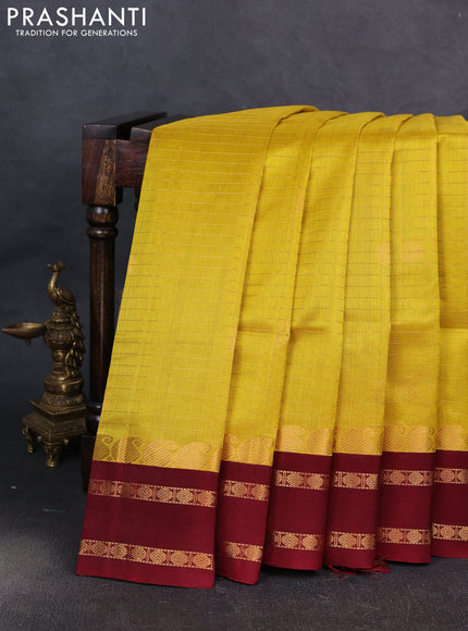 Kuppadam silk cotton saree yellow and maroon with allover zari checks & buttas and rettapet zari woven border