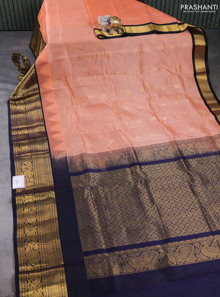 Kuppadam silk cotton saree peach orange and navy blue with allover zari woven buttas and zari woven border