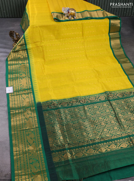 Kuppadam silk cotton saree yellow and green with allover vairaosi pattern & buttas and temple design long zari woven border