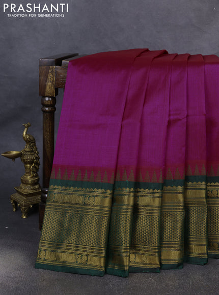 Kuppadam silk cotton saree pink and bottle green with plain body and temple design long zari woven border