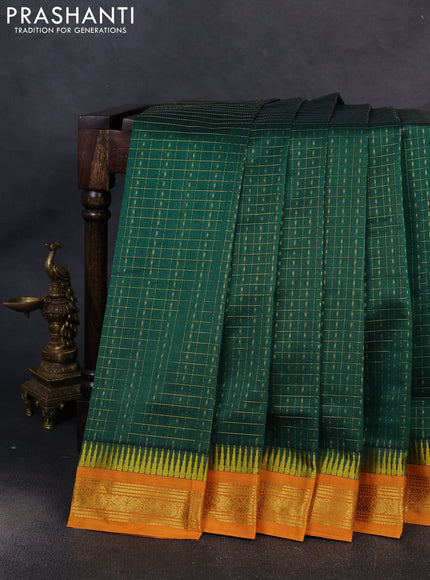 Kuppadam silk cotton saree green and mustard yellow with allover lakshadeepam pattern and temple design zari woven border