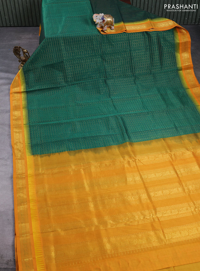 Kuppadam silk cotton saree green and mustard yellow with allover lakshadeepam pattern and temple design zari woven border