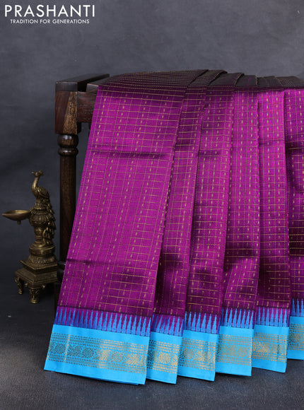 Kuppadam silk cotton saree purple and cs blue with allover lakshadeepam pattern and temple design zari woven border