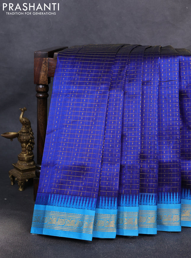 Kuppadam silk cotton saree blue and cs blue with allover lakshadeepam pattern and temple design zari woven border