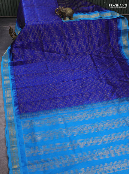 Kuppadam silk cotton saree blue and cs blue with allover lakshadeepam pattern and temple design zari woven border