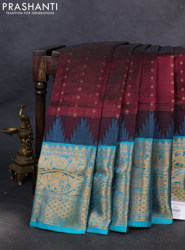 Kuppadam silk cotton saree wine shade and teal blue with allover vairaosi pattern & buttas and temple design long zari woven border