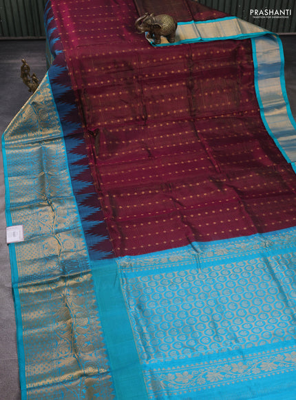 Kuppadam silk cotton saree wine shade and teal blue with allover vairaosi pattern & buttas and temple design long zari woven border