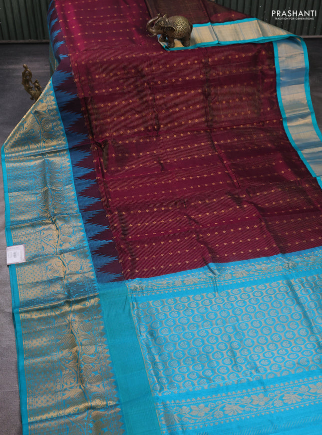 Kuppadam silk cotton saree wine shade and teal blue with allover vairaosi pattern & buttas and temple design long zari woven border
